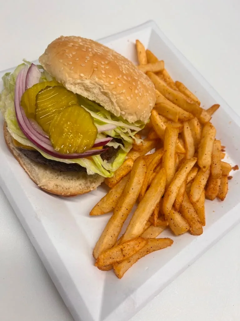 Cheeseburger and seasoned fries